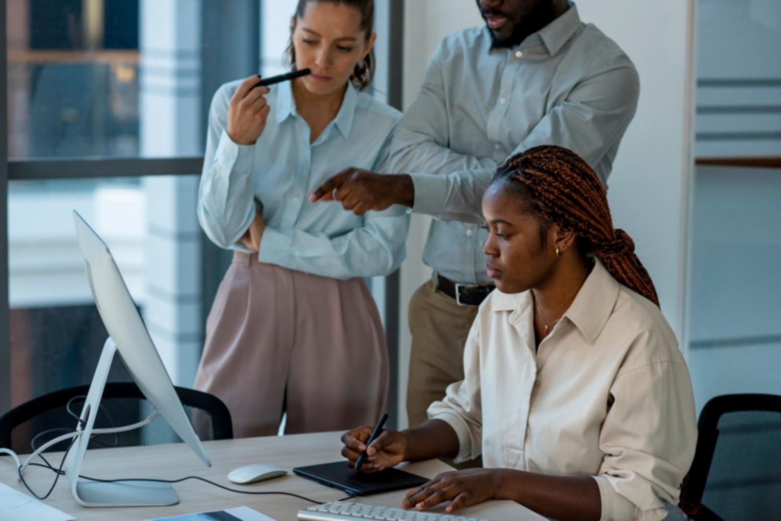 Modern financial modeling workspace with multiple screens showing real-time data integration