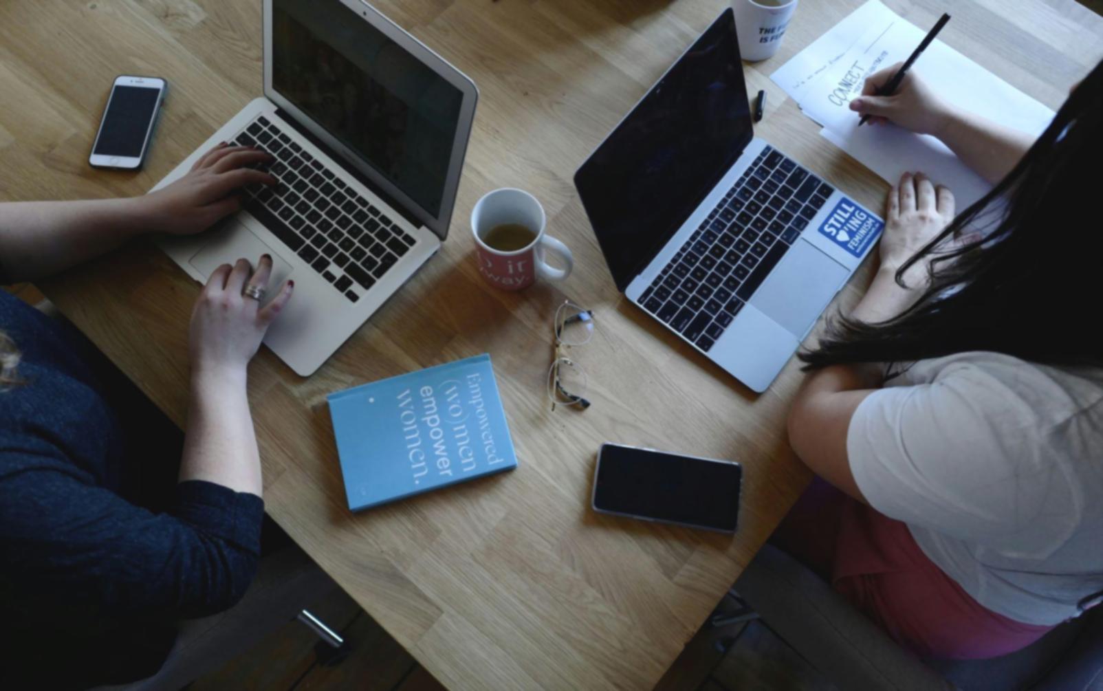 Team of financial analysts collaborating on complex modeling projects