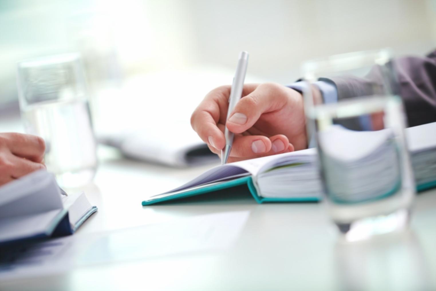 Financial analysts collaborating on complex modeling projects using advanced Excel techniques and data visualization tools